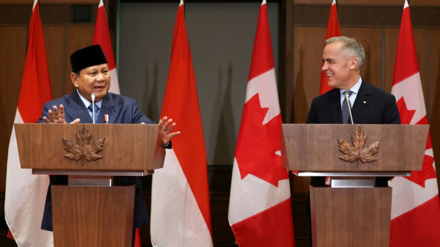 Prabowo Subianto (l.) und Mark Carney