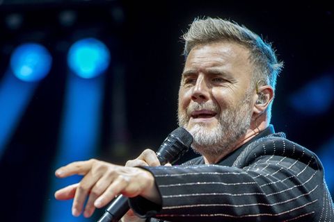 Seit 2005 steht Gary Barlow wieder mit Take That auf der Bühne. Die Band hat inzwischen nur noch drei Mitglieder. 2026 geht es
