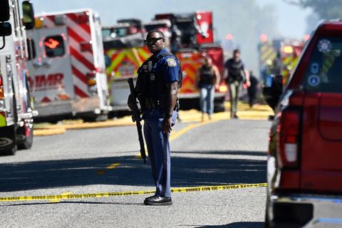 USA: Ein Michigan State Trooper steht in der Nähe der Kirche in Grand Blanc, wo sich die Tat ereignete