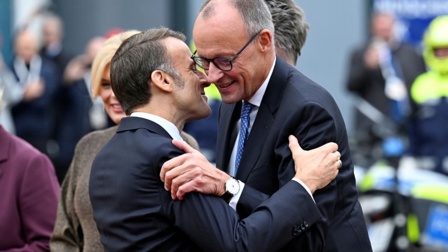 Macron (l.) und Merz