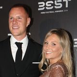 Marc-André ter Stegen und seine Ehefrau Daniela lächeln bei einer Gala im Jahr 2019