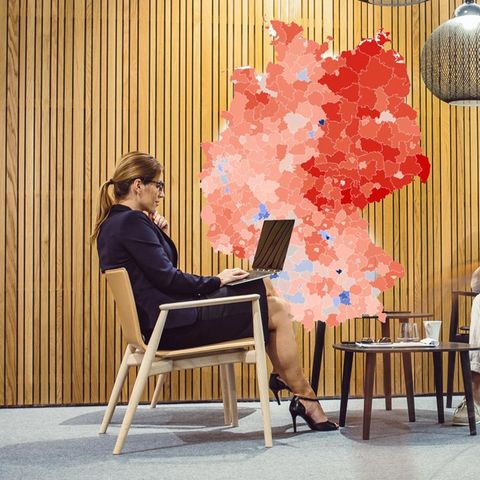 A businesswoman sits in the lobby + map of Germany infographic