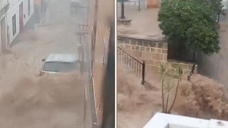 Braune Wassermassen schießen durch Straßen in Andalusien Braune Wassermassen schießen durch Straßen in Andalusien