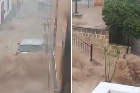 Braune Wassermassen schießen durch Straßen in Andalusien