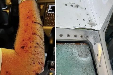 Pilot hat Splitter im Arm / Zerstörte Scheibe des Flugzeugs