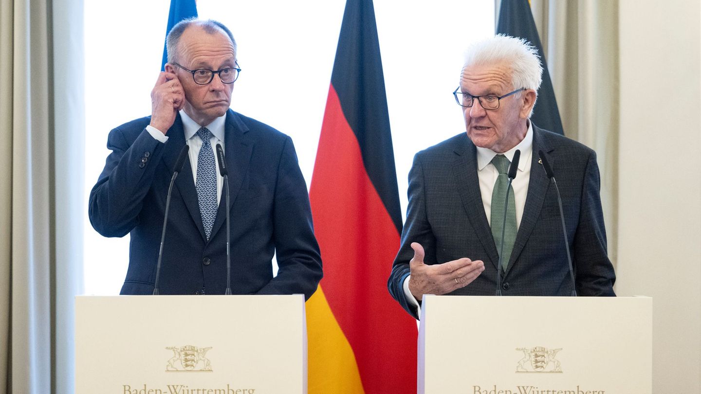 Merz und Kretschmann tauschten sich über Wirtschaft und Forschung. Foto: Marijan Murat/dpa