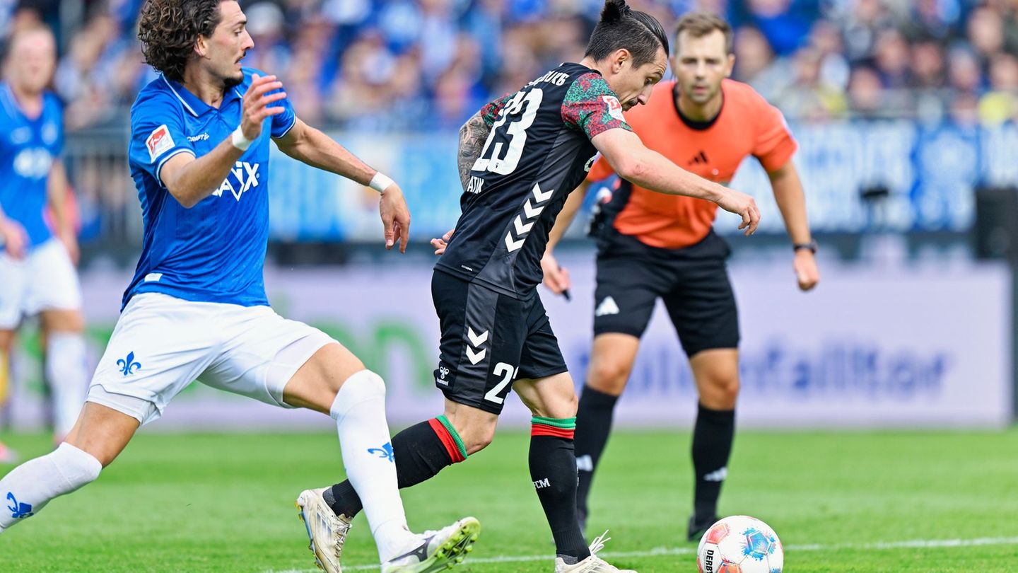 Auf aufgrund Magdeburgs Punkt in Darmstadt soll das aktuelle Trainerduo die Mannschaft weiter führen. Foto: Uwe Anspach/dpa