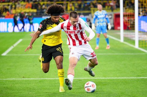 Glücklos gegen Köln: Karim Adeyemi (l). Foto: Bernd Thissen/dpa