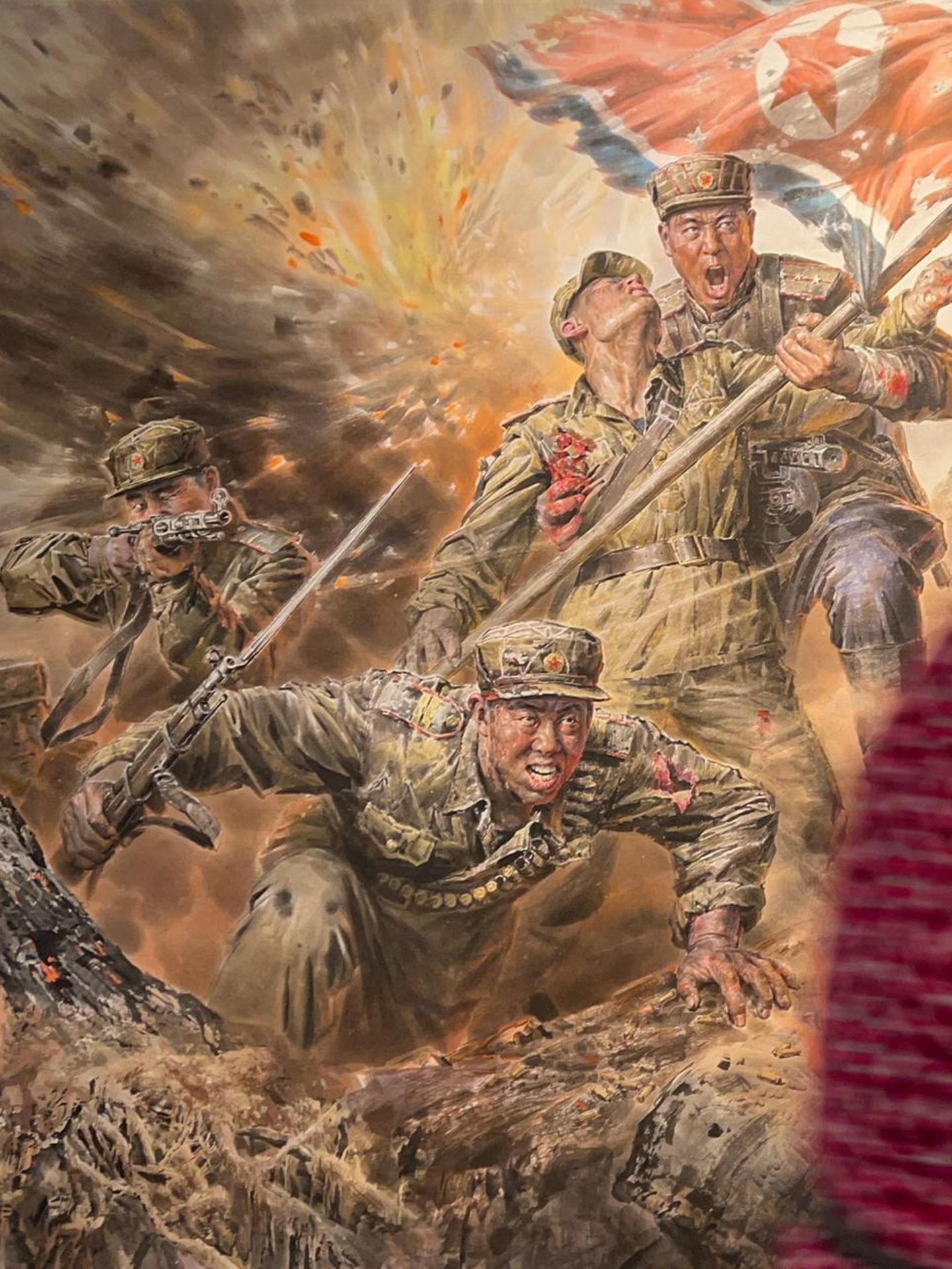 Nordkorea und Russland: Geballer, Gemetzel, Heldentod: ein Bild mit Soldaten aus Nordkorea im Ukrainekrieg, zu sehen in einer Ausstellung in Moskau Geballer, Gemetzel, Heldentod: ein Bild mit Soldaten aus Nordkorea im Ukrainekrieg, zu sehen in einer Ausstellung in Moskau