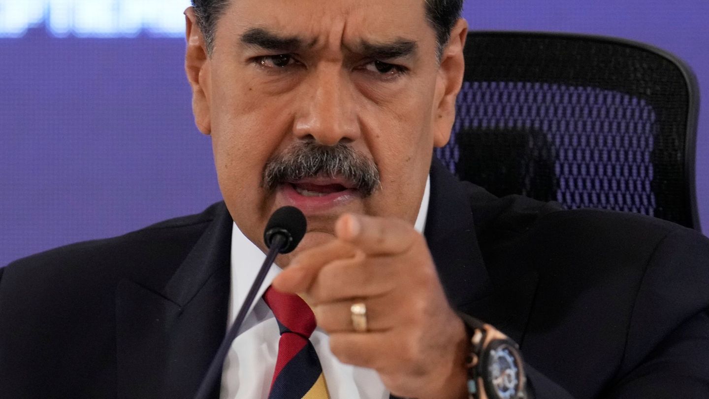 Russland ist mit dem venezolanischen Präsidenten Maduro verbündet. Foto: Ariana Cubillos/AP/dpa
