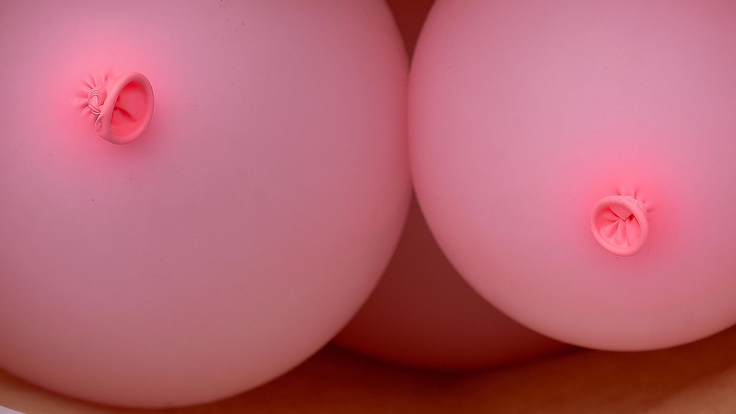 Zwei Luftballons in rosaner Farbe. Symbolbild Sexcoaching
