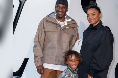 Pusha T mit Ehefrau Virginia und Sohn Nigel auf einem Event.