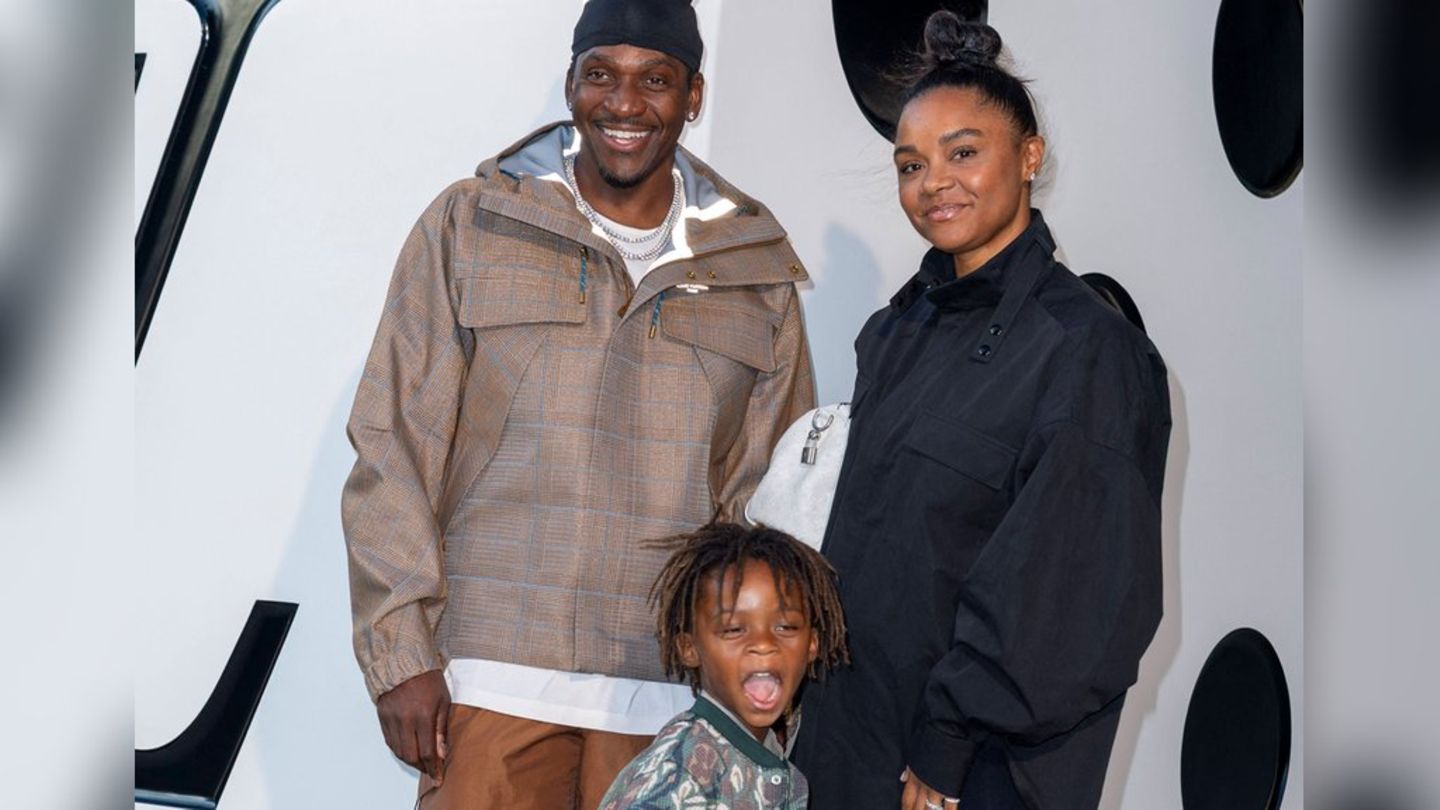 Pusha T mit Ehefrau Virginia und Sohn Nigel auf einem Event.