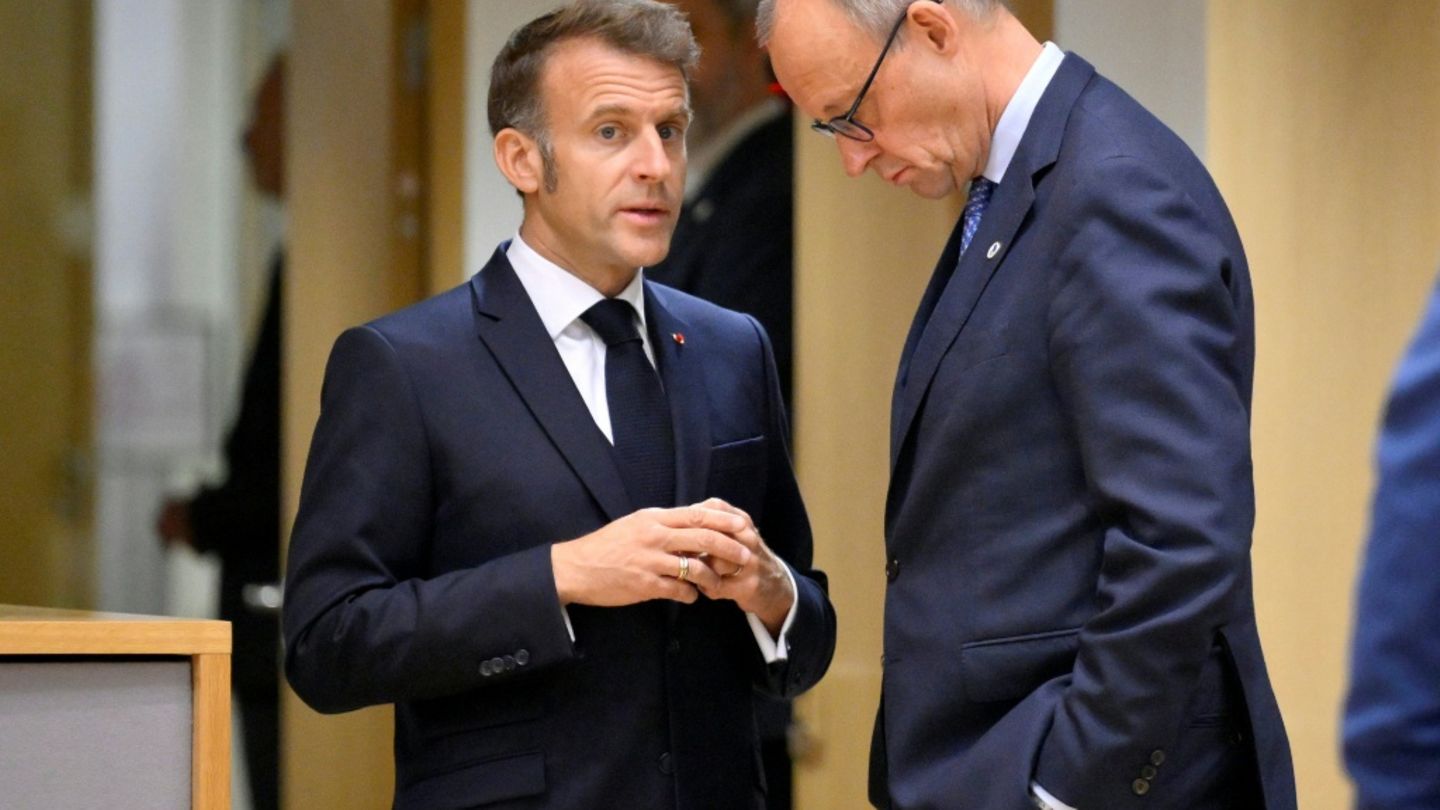 Macron (l.) und Merz