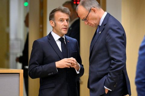 Macron (l.) und Merz