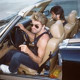 George Michael mit Sonnebrille am Steuer eines Cabrios