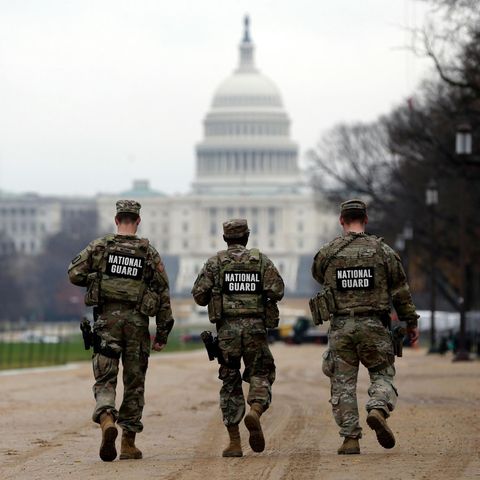 Drei Nationalgardisten patroullieren in Washington