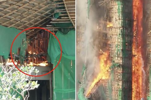 Ein Hochhaus-Komplex in Hongkong geht in Flammen auf. Das Bild zeigt die ersten Feuer