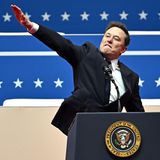 Elon Musk mit ausgestrecktem rechten Arm