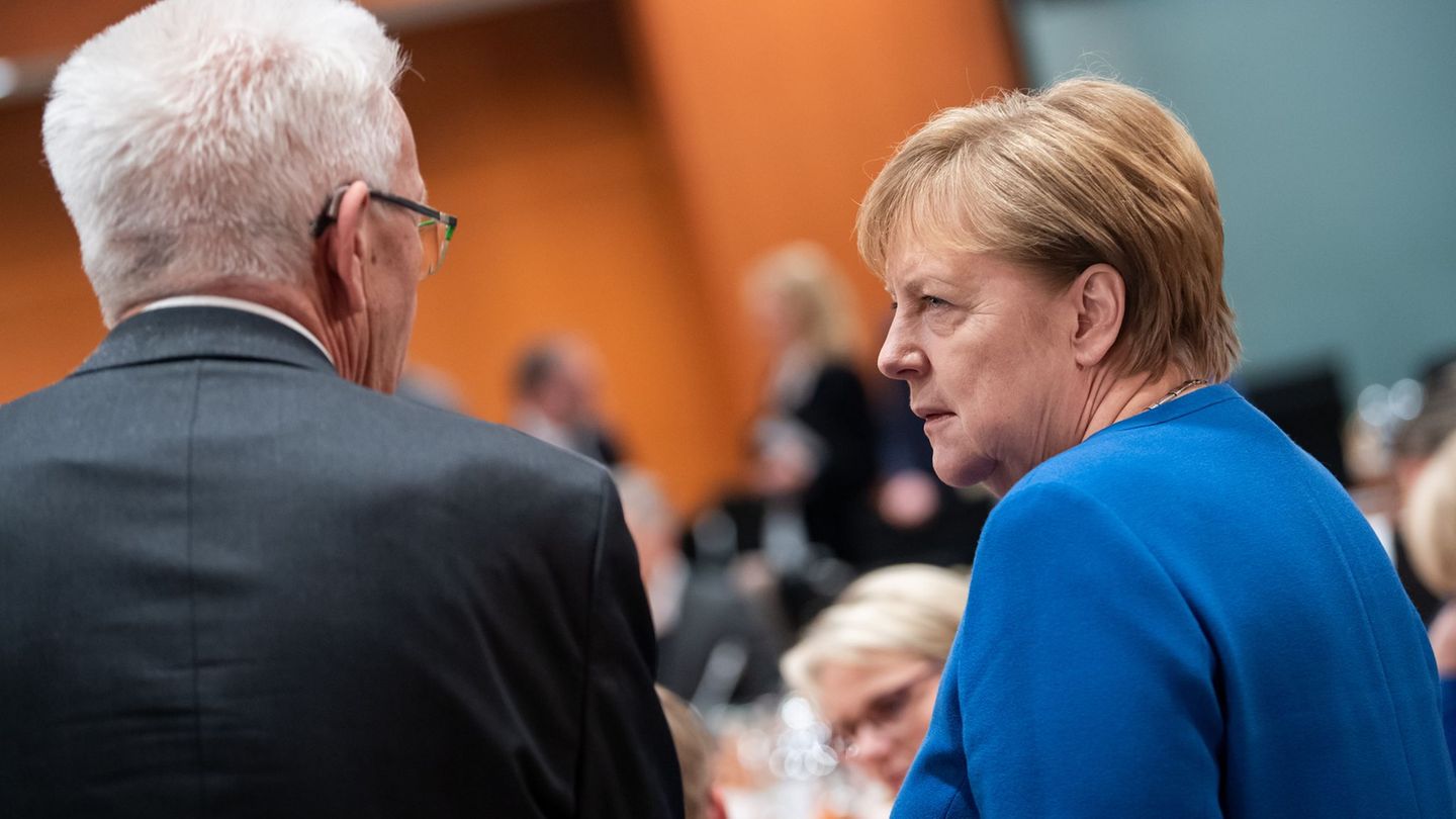 Die beiden mögen und schätzen sich: Ministerpräsident Winfried Kretschmann und die frühere Bundeskanzlerin Angela Merkel. (Archi