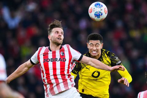 Lucas Höler (l.) traf sehenswert, Jobe Bellingham sah Rot. Foto: Tom Weller/dpa