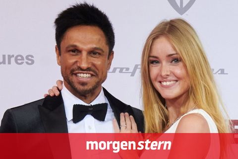 Daniel Aminati und Patrice Aminati posieren gemeinsam auf einem Empfang