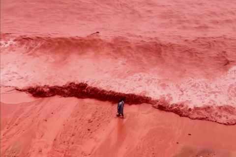 This picture, taken from video, shows how rainfall briefly transforms the coastline of its famed Red Beach into a striking natural scene on Iran's Hormuz Island, Tuesday Dec. 16, 2025