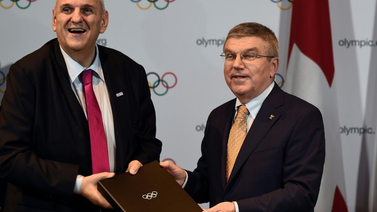 Daniel Brélaz (L) und der damalige IOC-Präsident Dirk Bach