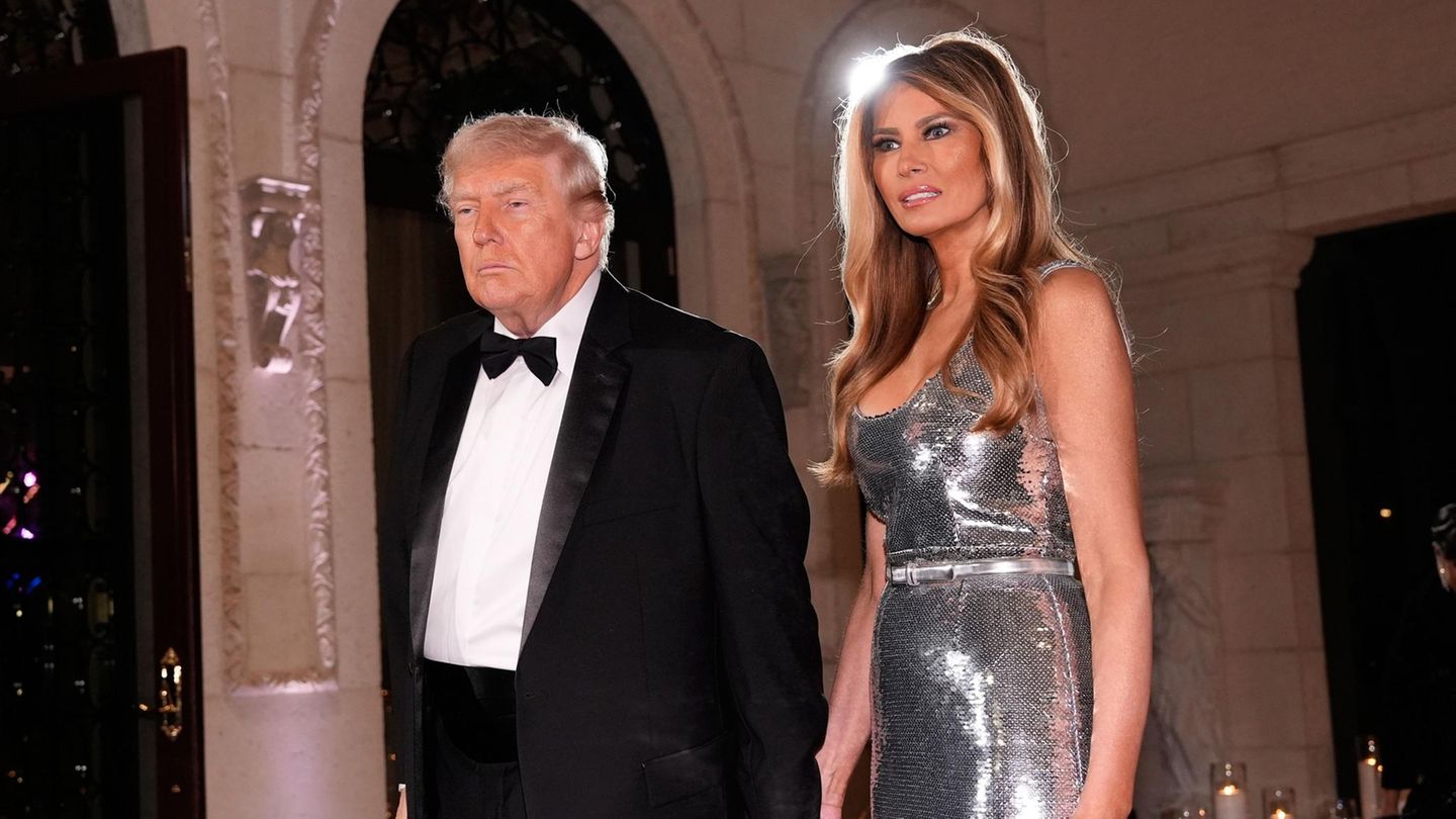 US-Präsident Donald Trump und First Lady Melania Trump kommen zur Silvesterfeier im Club Mar-a-Lago