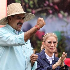 Nicolás Maduro und seine Frau Cilia Flores bei einer Kundgebung im Dezember