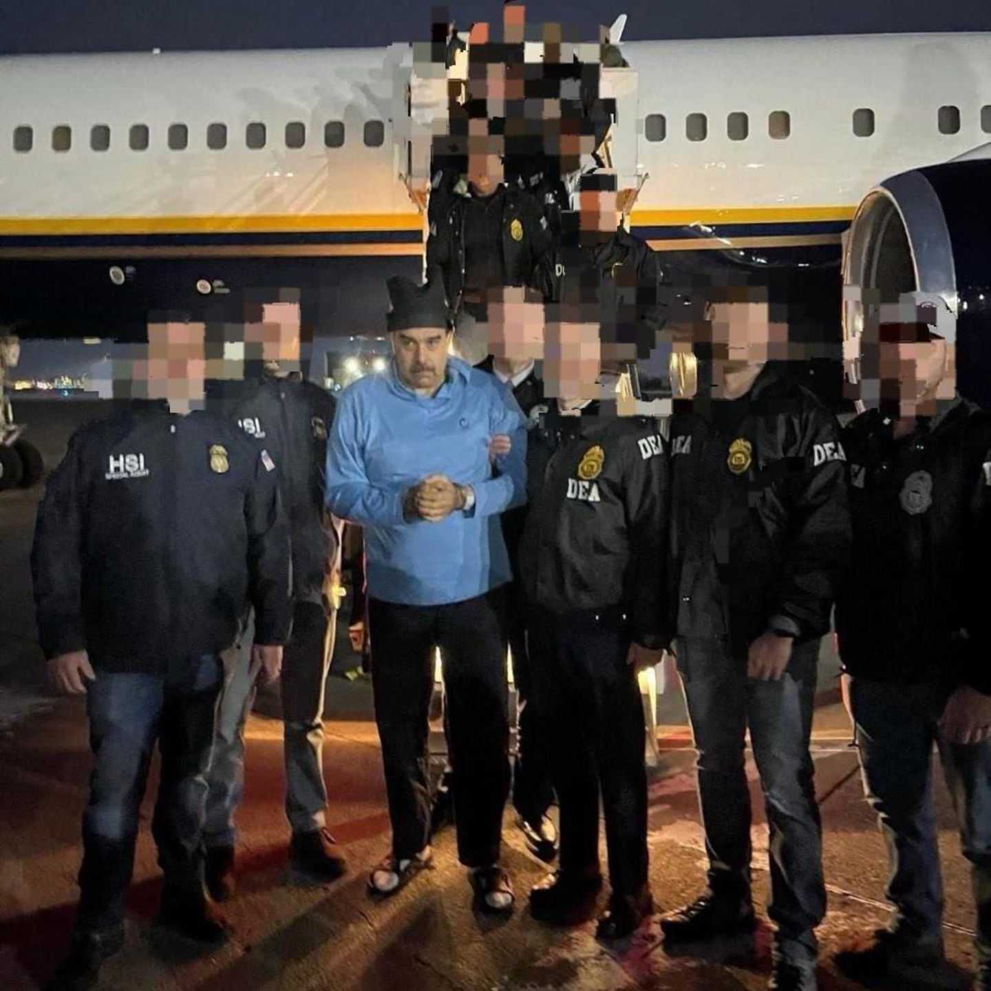 Venezuelas Machthaber Nicolás Maduro umgeben von US-Beamten