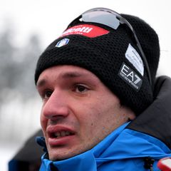 Bei der Erinnerung an seinen Freund weint Tommaso Giacomel. Foto: Hendrik Schmidt/dpa