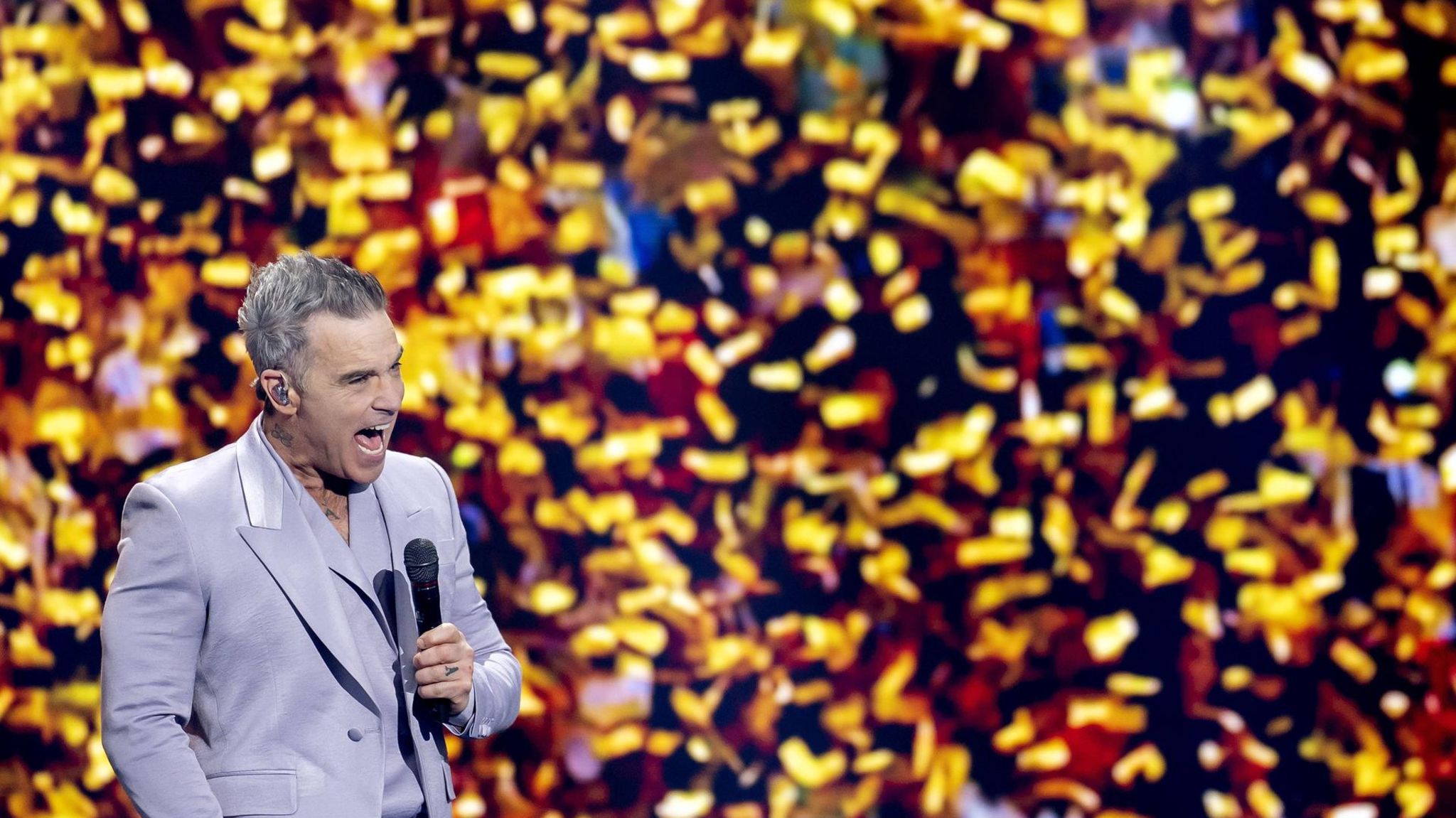 Robbie Williams on stage