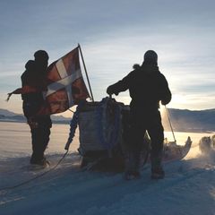 Grönland Zwei Männer mit Schlitten