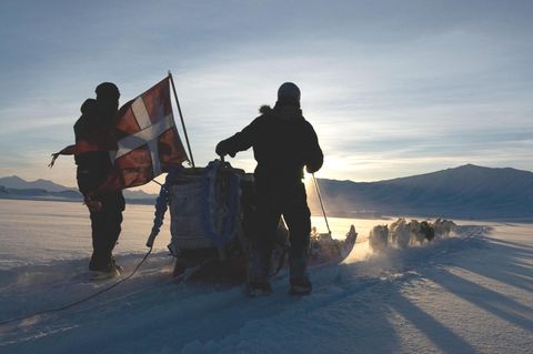 Grönland Zwei Männer mit Schlitten