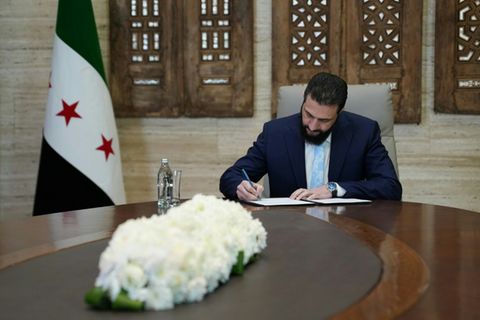 Al-Scharaa beim Unterschreiben eines Waffenruhe-Abkommens