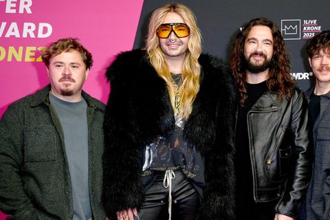 Gustav Schäfer, Bill Kaulitz, Tom Kaulitz und Georg Listing (v.l.) stehen als Tokio Hotel auf der Bühne.