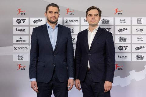 Marc Lenz (l.) und Steffen Merkel: Rekordzahlen beim Wirtschaftsreport der DFL. Foto: Jürgen Kessler/dpa