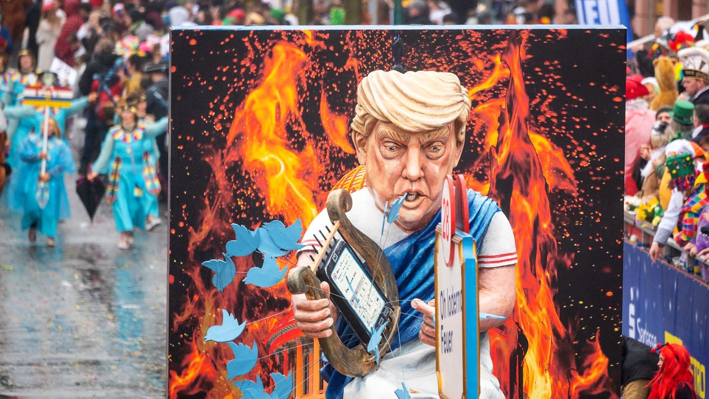 Donald Trump wird wohl auch dieses Jahr ein Thema der Umzüge sein. (Archivbild) Foto: Andreas Arnold/dpa