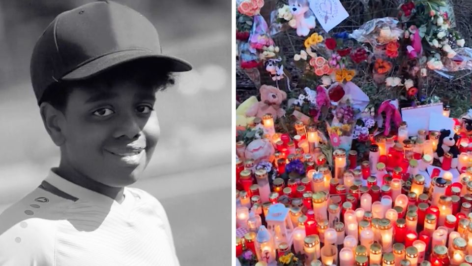 Menschen legen Kerzen und Blumen für den getöteten Yosef nieder.