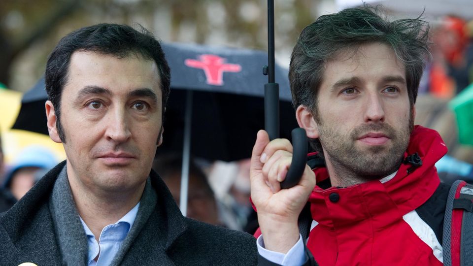 Cem Özdemir und Boris Palmer im Regen