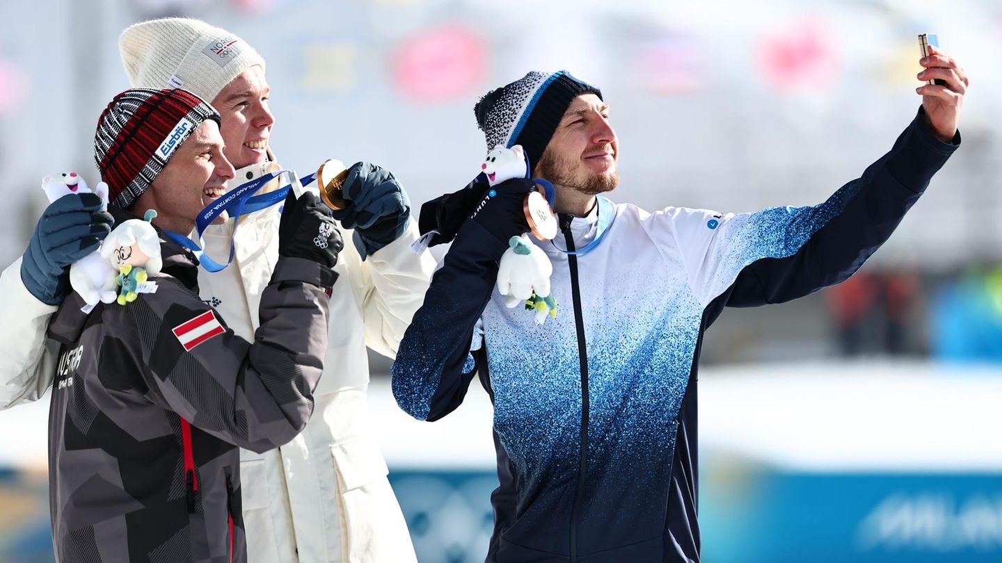 Glückliche Sieger bei den olympischen Winterspielen in Mailand