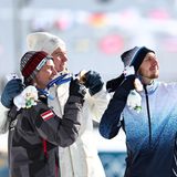 Glückliche Sieger bei den olympischen Winterspielen in Mailand