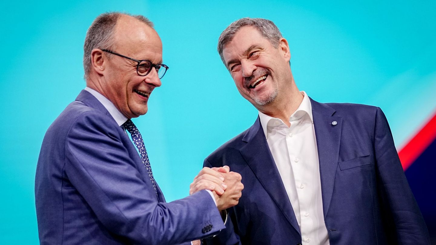 Zwischen diese beiden passt beim CDU-Parteitag kein Blatt. Foto: Kay Nietfeld/dpa