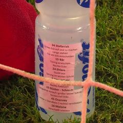 Trinkflasche mit Elfmeter-Zettel von Marius Funk. Foto: -/MagentaSport/dpa