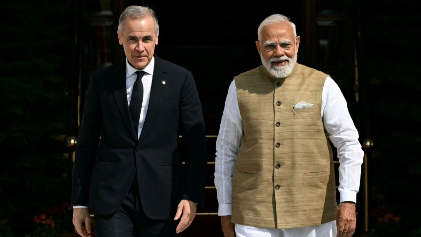 Mark Carney (l.) und Narendra Modi