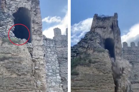 Ein alter Turm bricht zusammen.