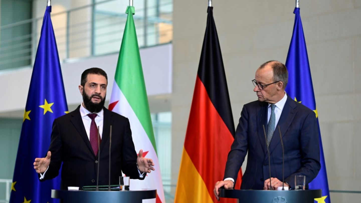 Al-Scharaa (l.) und Merz