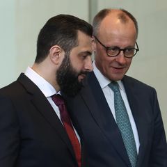 Friedrich Merz und Ahmed al-Scharaa