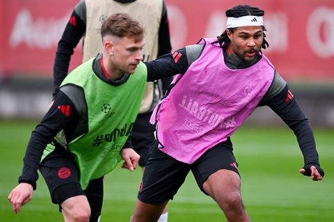 Joshua Kimmich (l) und Serge Gnabry in Aktion beim Abschlusstraining. Foto: Sven Hoppe/dpa